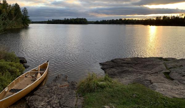 Canoe on the lake shore in the Boundary Waters