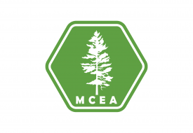 green M C E A logo hexagon with pine tree