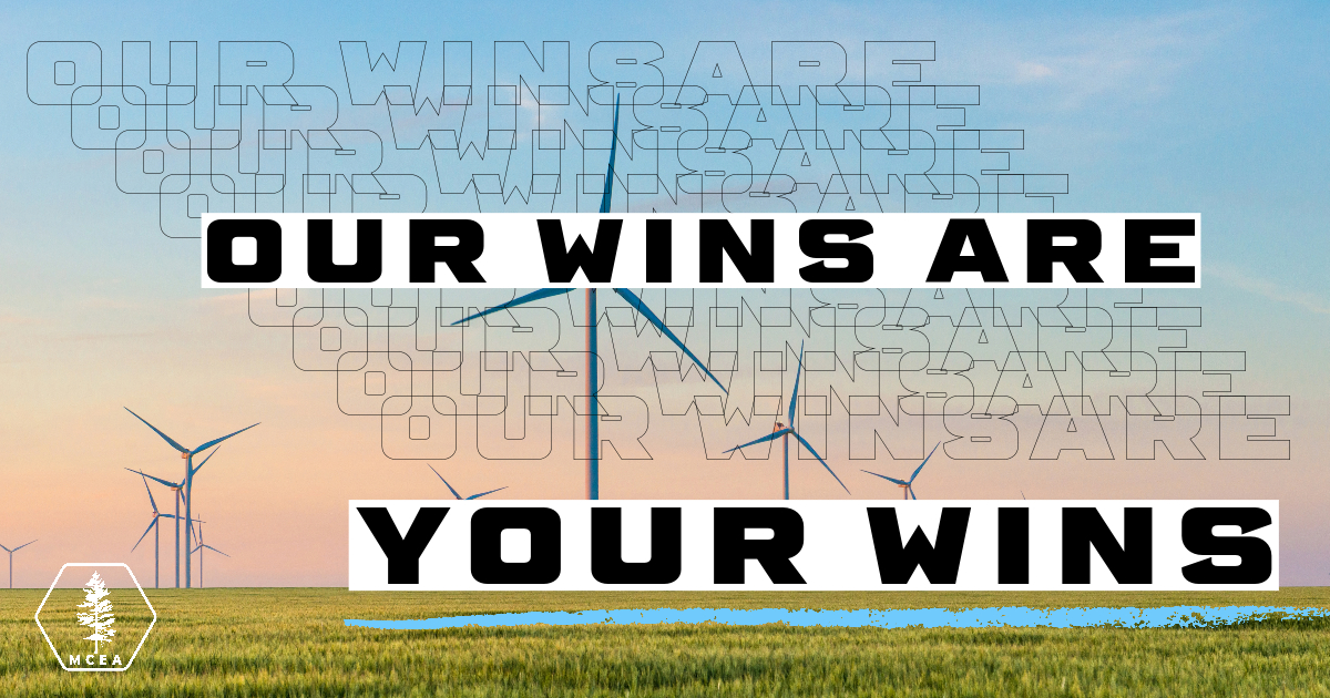 our wins are your wins in front of windmills