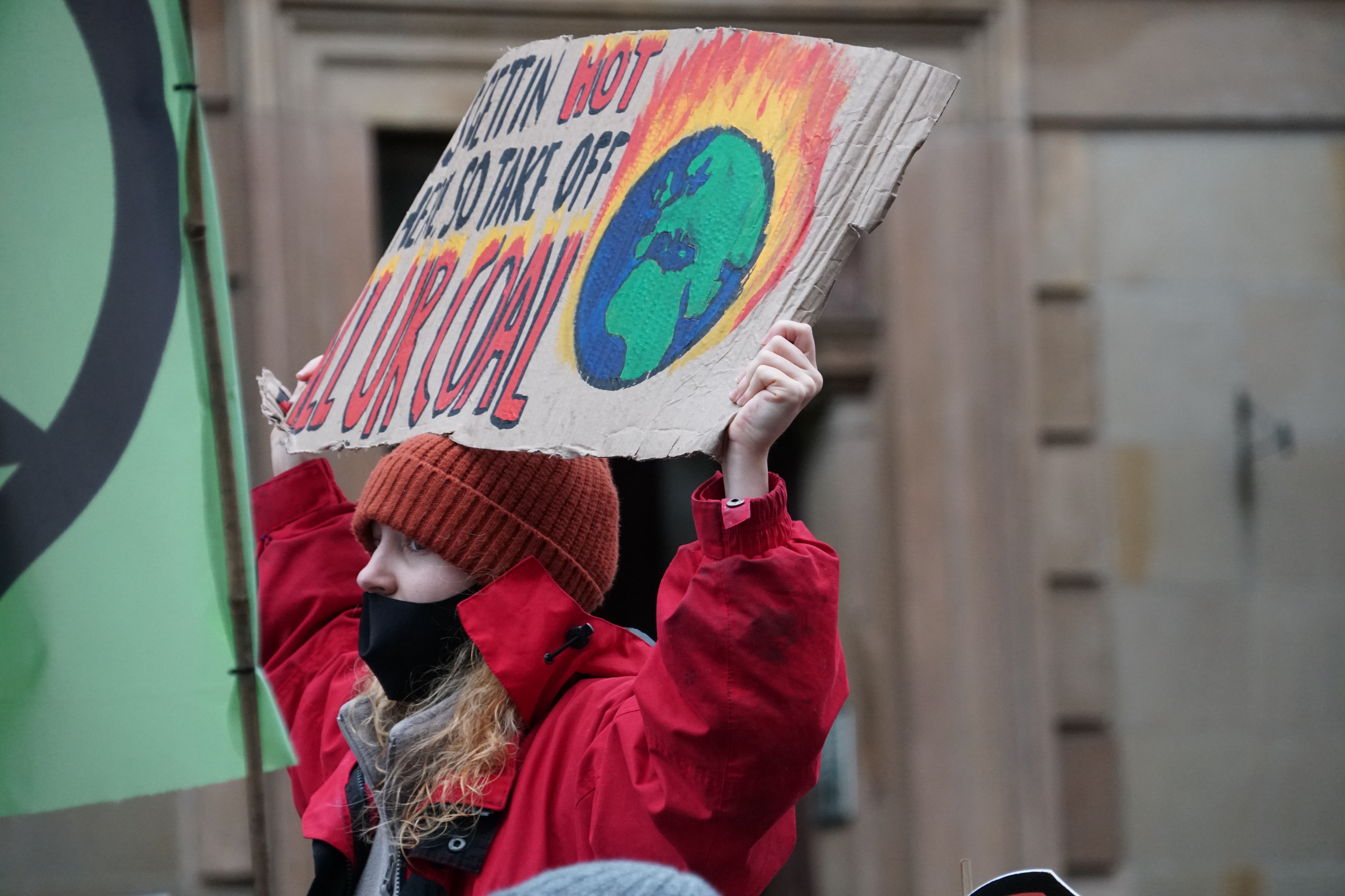 Protester at Glasgow march during COP26