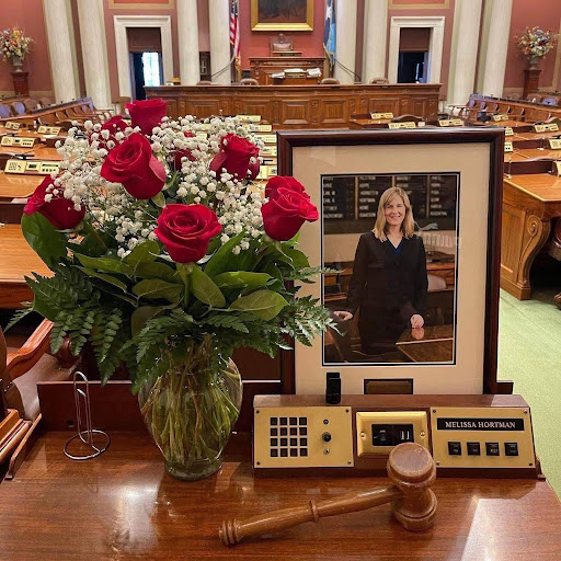 melissa hortman's desk with roses