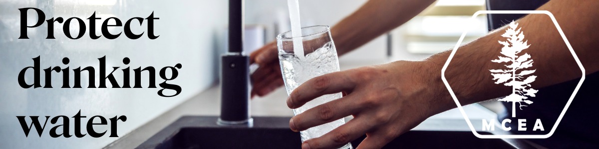 a hand getting tap water with words protect drinking water
