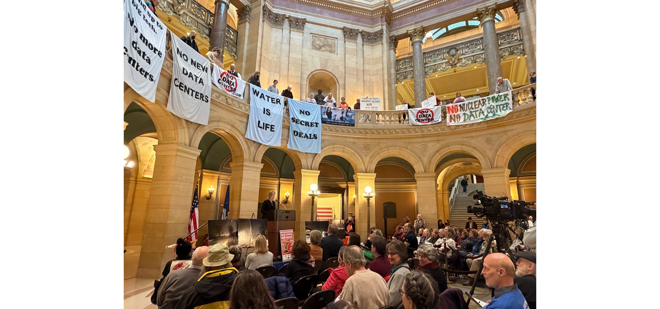 m c e a executive officer addresses crowd at data center rally