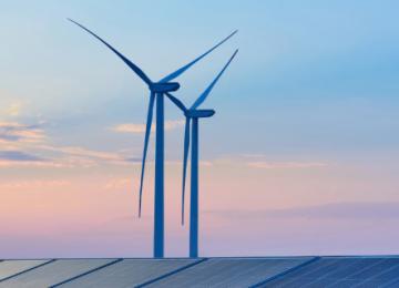 wind turbines blue sky water