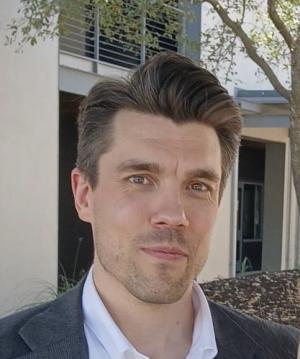 photo of  Tom Weizenegger, a white man in a button down shirt