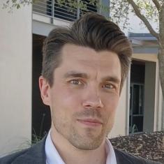 photo of  Tom Weizenegger, a white man in a button down shirt