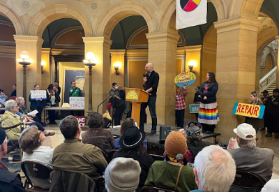 speaker at rally at state capitol