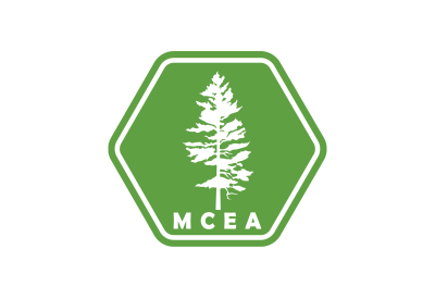 m c e a logo with green hexagon and pine tree