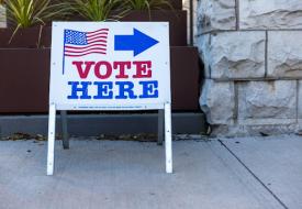 "Vote here" sign