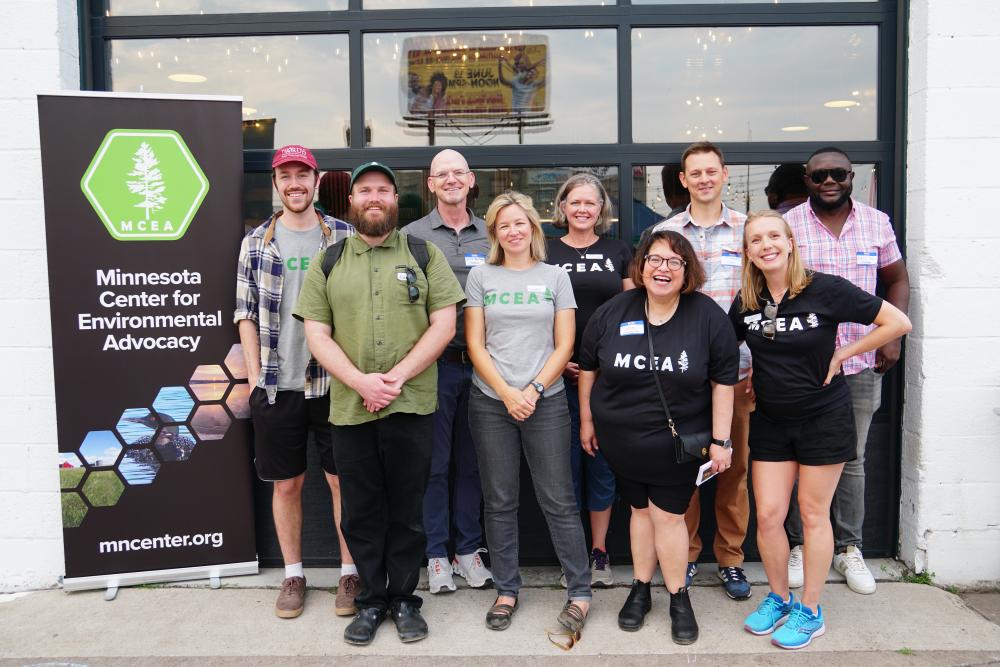 group photo of M C E A staff members in attendance at the 2023 Duluth event at Wild State Cider
